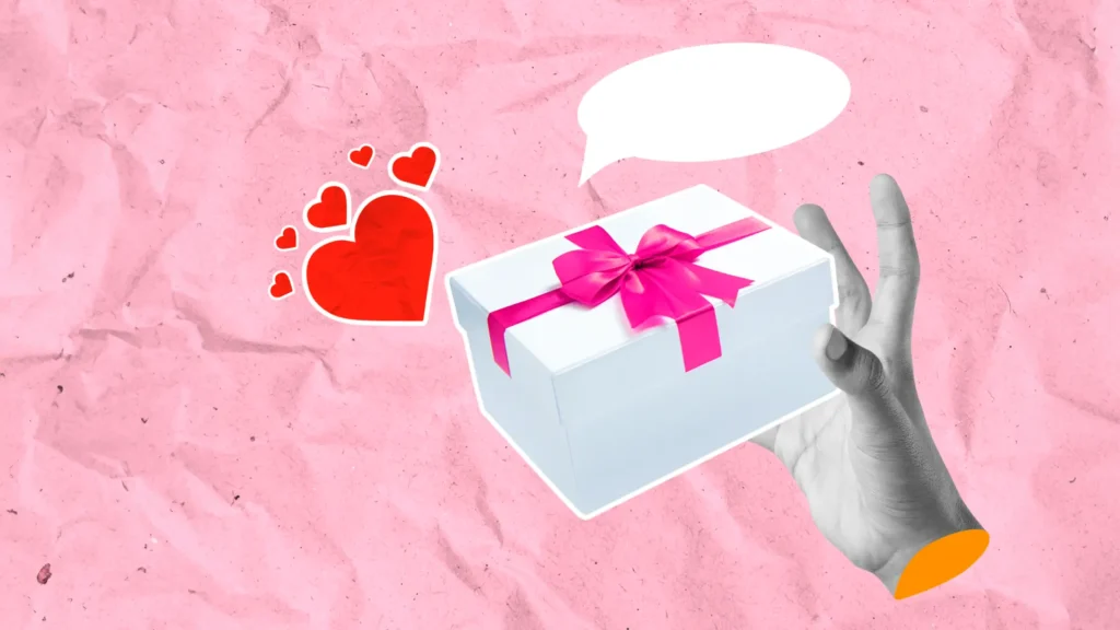 una mano con una caja de regalo de escape room para celebración empresarial